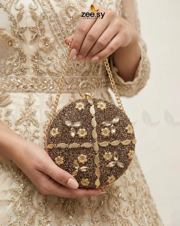 mahogany-leaf-embellished-clutch-bag